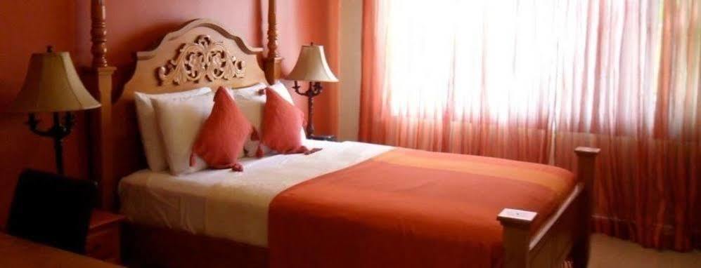 Inn Flight Suites Piarco Экстерьер фото
